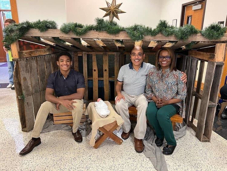 Me and my parents taking nativity photos together